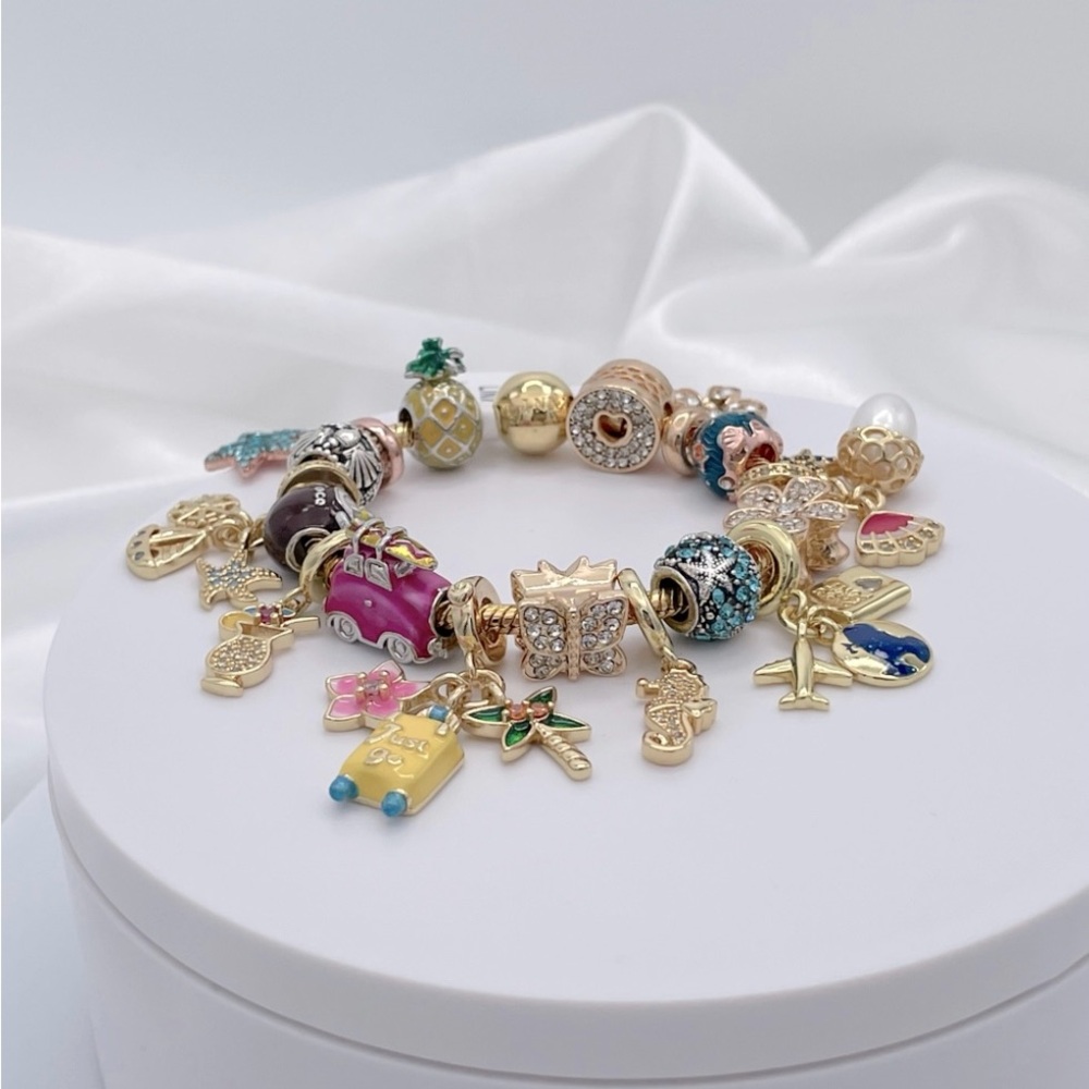 Linx Yellow Gold Bracelet with Beach Vacation Themed Charms